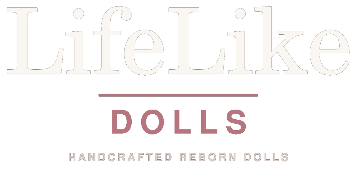 A minimalist logo graphic on a white background featuring the text 'LifeLike' in a large, light beige serif font, with 'DOLLS' in a dusty rose serif font below, and 'HANDCRAFTED REBORN DOLLS' in a smaller, matching beige font underneath.